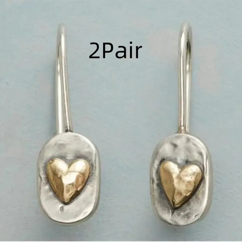 Polished silver minimalist geometric love heart earrings with romantic design, stylish jewelry by Plush Fashion Hub