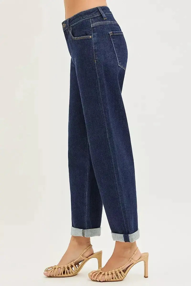 Slouchy cropped boyfriend jeans with cuffed hem by Trendsi, featuring relaxed fit and casual denim style.