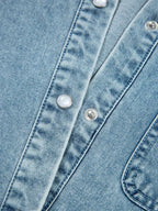Casual denim mini dress with smocked cuffs and flared hem, featuring a button-down front, from Trendsi's denim collection.