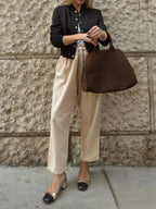 Women's lightweight cropped bomber jacket with snap buttons, casual outerwear in a trendy style by Trendsi.