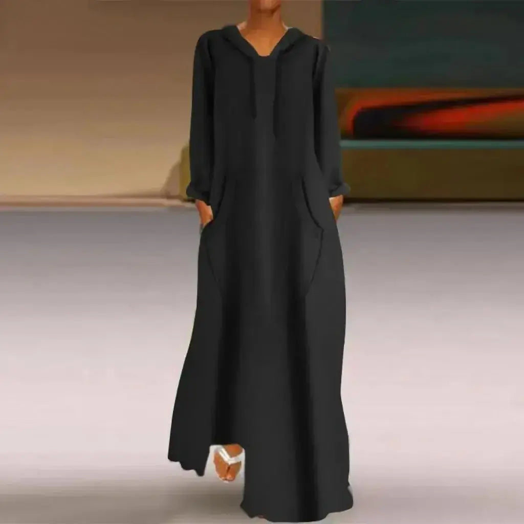 Solid-colored women's relaxed fit long hooded sweatshirt by Plush Fashion Hub, casual cozy pullover with a comfortable loose fit.