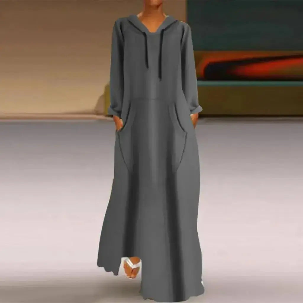 Women's relaxed fit long hooded sweatshirt by Plush Fashion Hub, solid color, cozy casual pullover with a relaxed silhouette.
