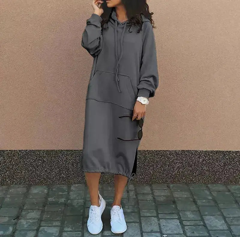 Solid color women's long sleeve hooded sweatshirt by Plush Fashion Hub, featuring a drawstring hood and oversized fit.