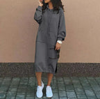 Solid color women's long sleeve hooded sweatshirt by Plush Fashion Hub, featuring a drawstring hood and oversized fit.