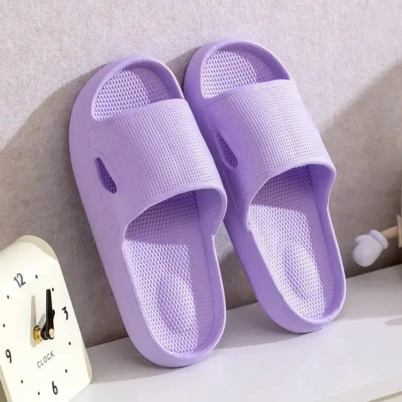 Plush Fashion Hub unisex thick sole EVA bathroom slippers with non-slip bottom, solid color indoor slides for home use.