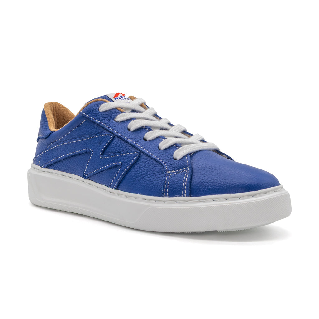 Blue BLKSWN Footwear lowtop sneaker with solid color design, viewed from an angled side perspective.