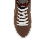 Brown BLKSWN Footwear 601 Solid lowtop sneaker showing a close-up of the solid brown canvas upper and white rubber sole.