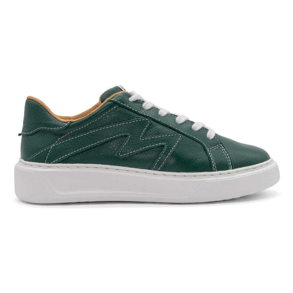 BLKSWN Footwear 601 Solid Forest low-top sneakers showing a solid forest green color on the right shoe.