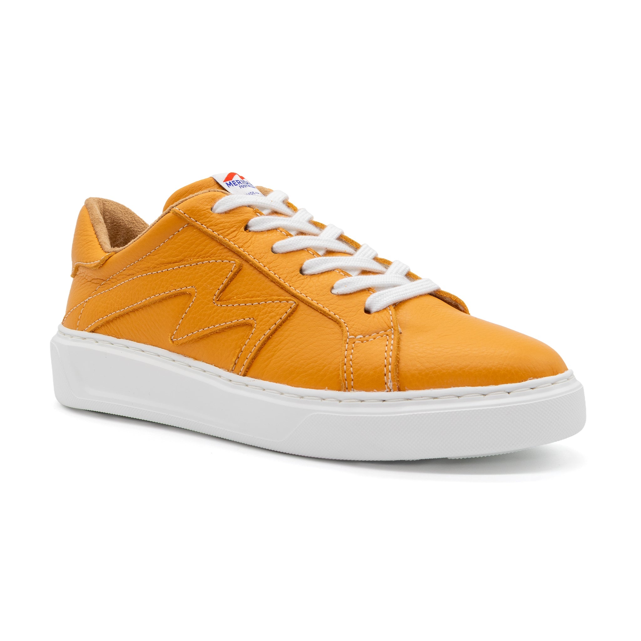 BLKSWN Footwear 601 Solid Gold lowtop sneaker featuring a sleek gold design, viewed from an angled perspective.