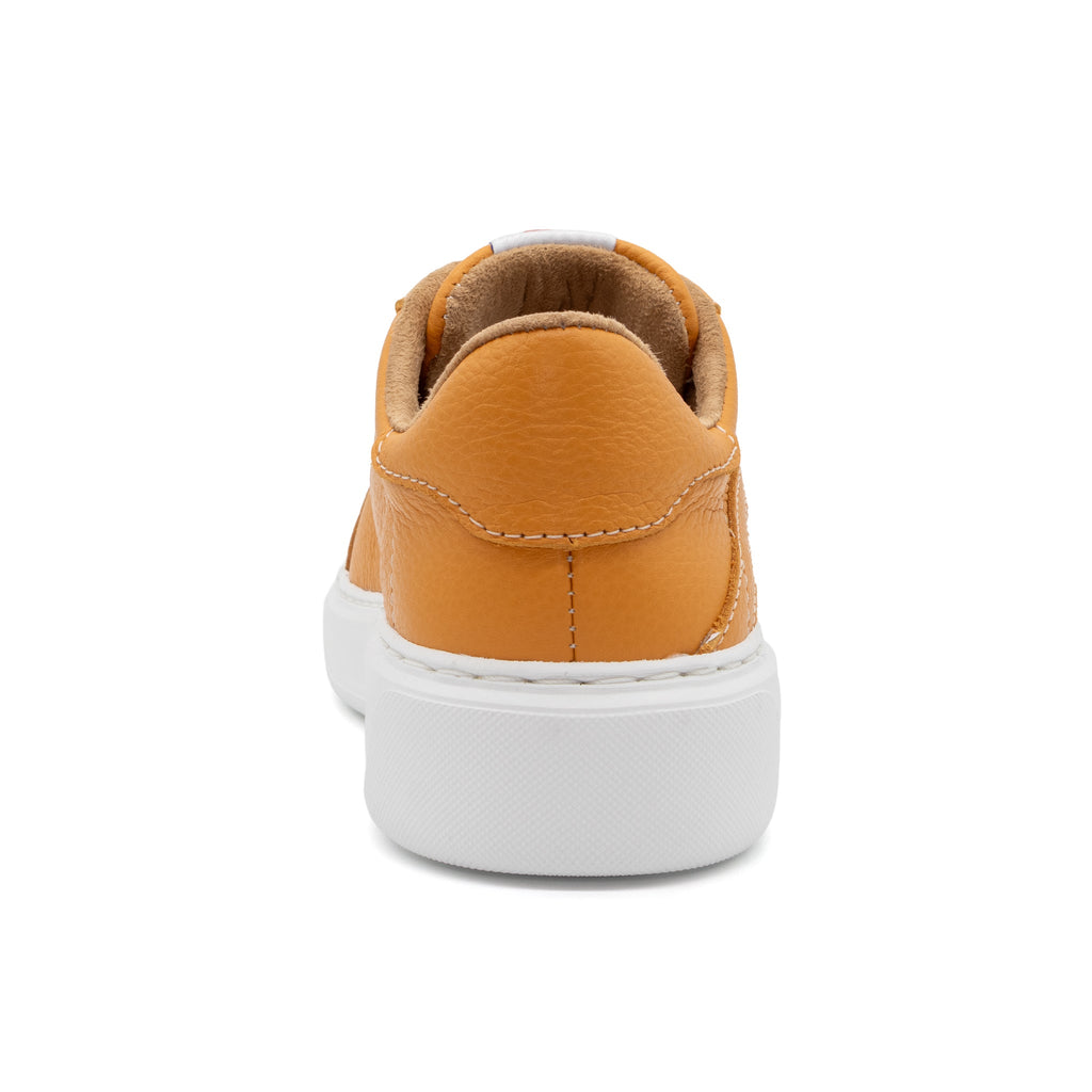 BLKSWN Footwear 601 Solid Gold lowtop sneaker shown from the back in solid gold color, showcasing sleek design and stylish finish.