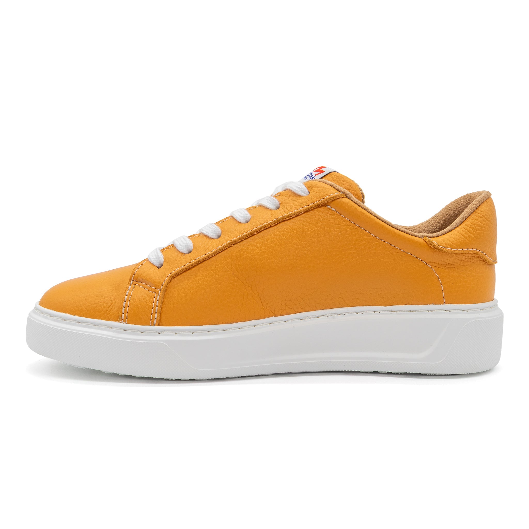 Left view of BLKSWN Footwear 601 Solid Gold lowtop sneaker featuring a sleek solid gold design.