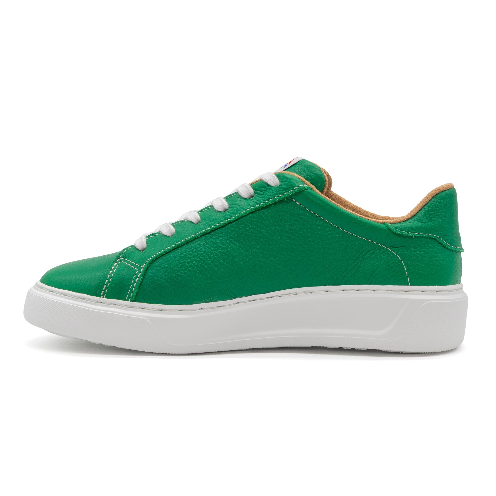 Green BLKSWN Footwear low-top sneaker with solid color design, shown from the left side.