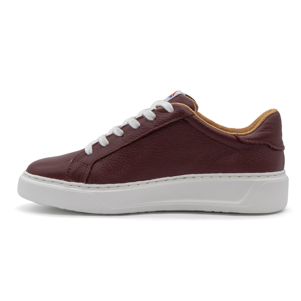 Maroon BLKSWN Footwear lowtop sneaker in solid color, showing the left shoe with laces and casual design.