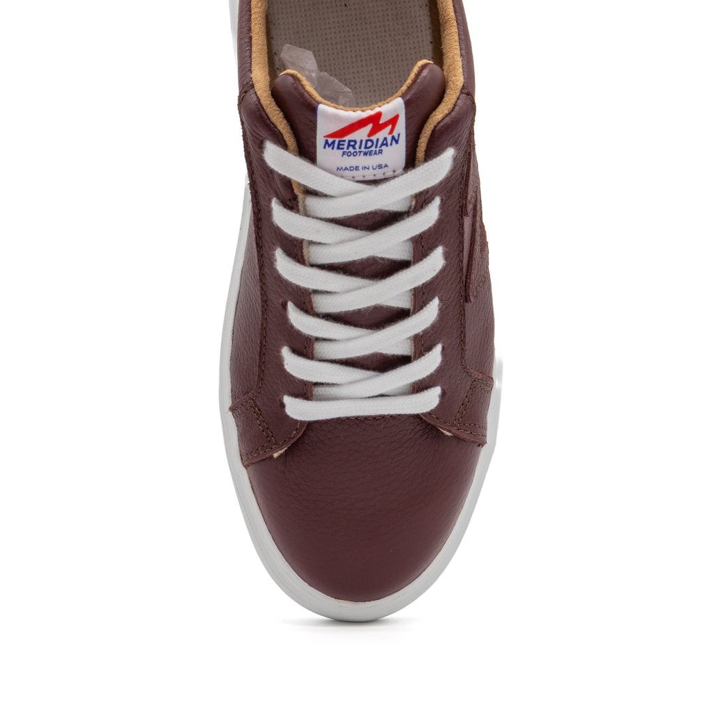 Maroon BLKSWN Footwear 601 Solid lowtop sneaker with a sleek, minimalist design and smooth maroon upper.