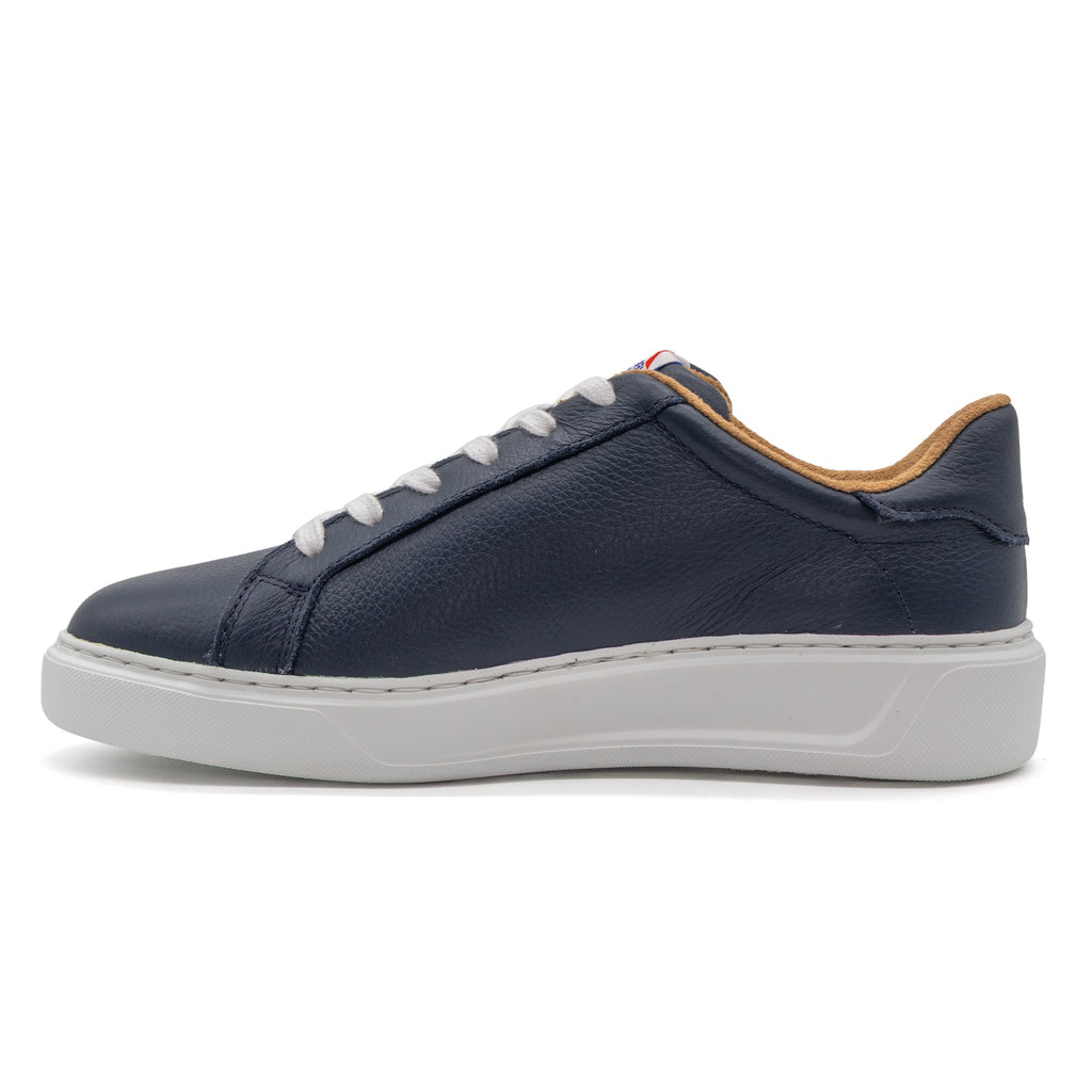 Navy blue BLKSWN Footwear 601 Solid low-top sneaker shown from the left side.