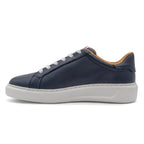 Navy blue BLKSWN Footwear 601 Solid low-top sneaker shown from the left side.