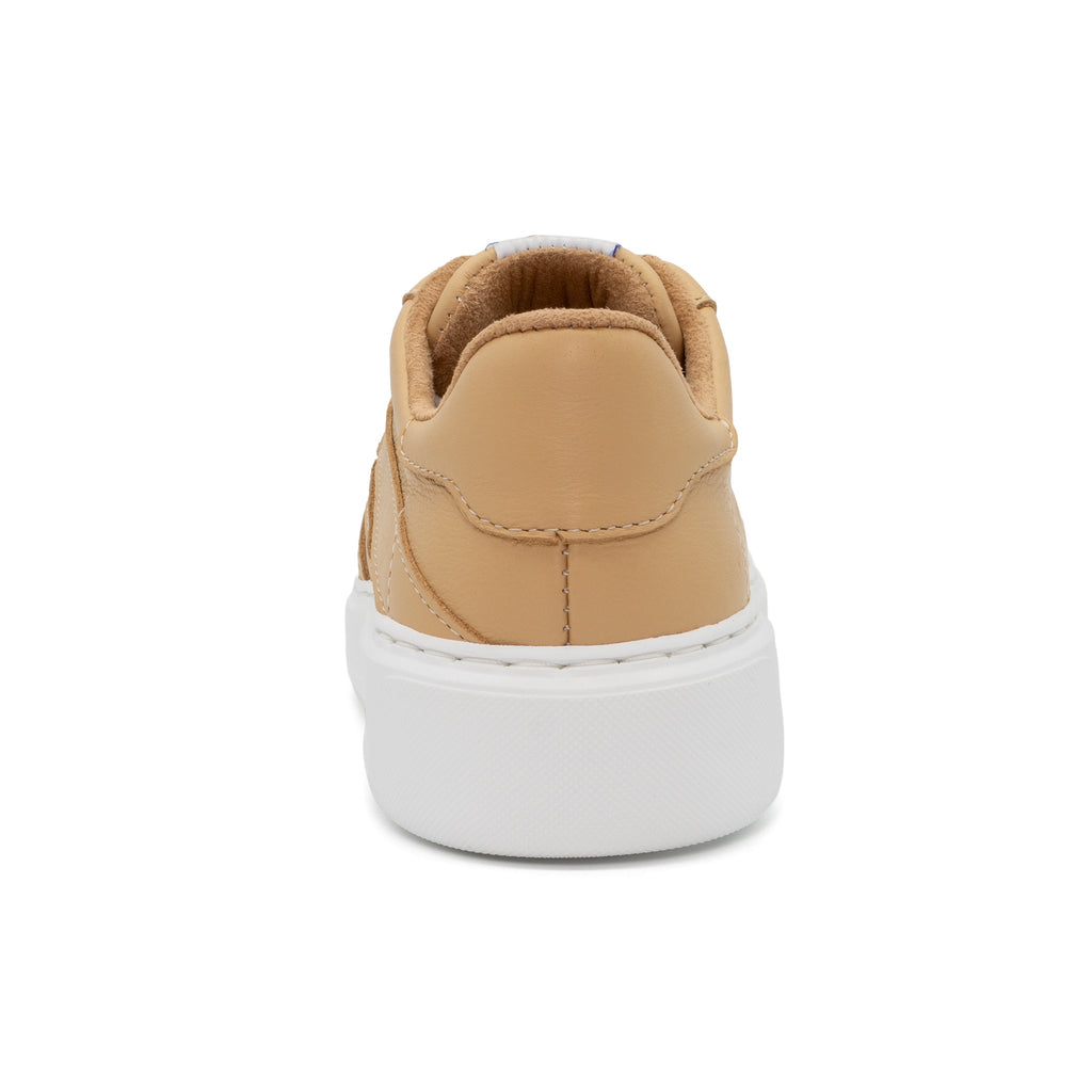 Back view of BLKSWN Footwear 601 Solid Old Gold low-top sneaker showing the solid gold color and design details.