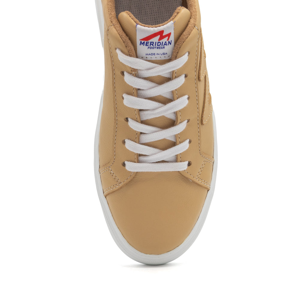BLKSWN Footwear 601 Solid Old Gold low-top sneakers with a sleek solid gold design and classic low-cut style.