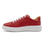 Red BLKSWN Footwear lowtop sneaker with solid design, featuring a comfortable canvas upper and flat rubber sole.