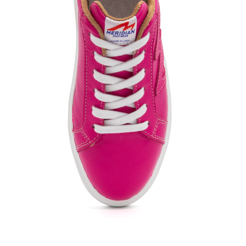 Pink BLKSWN Footwear lowtop sneaker with solid color design, featuring a sleek and stylish look.