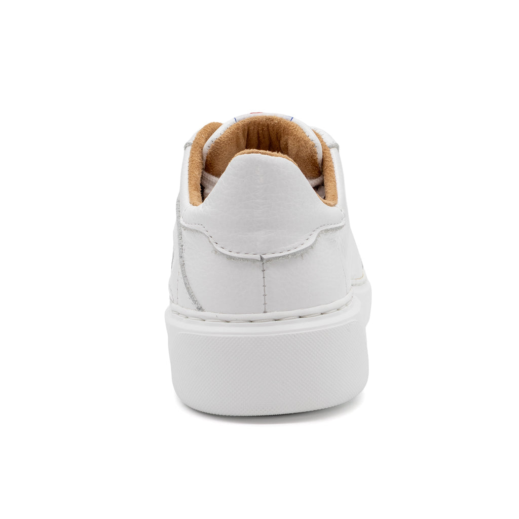 White BLKSWN Footwear 601 Solid lowtop sneaker shown from the back, featuring a clean, minimalist design and white rubber sole.