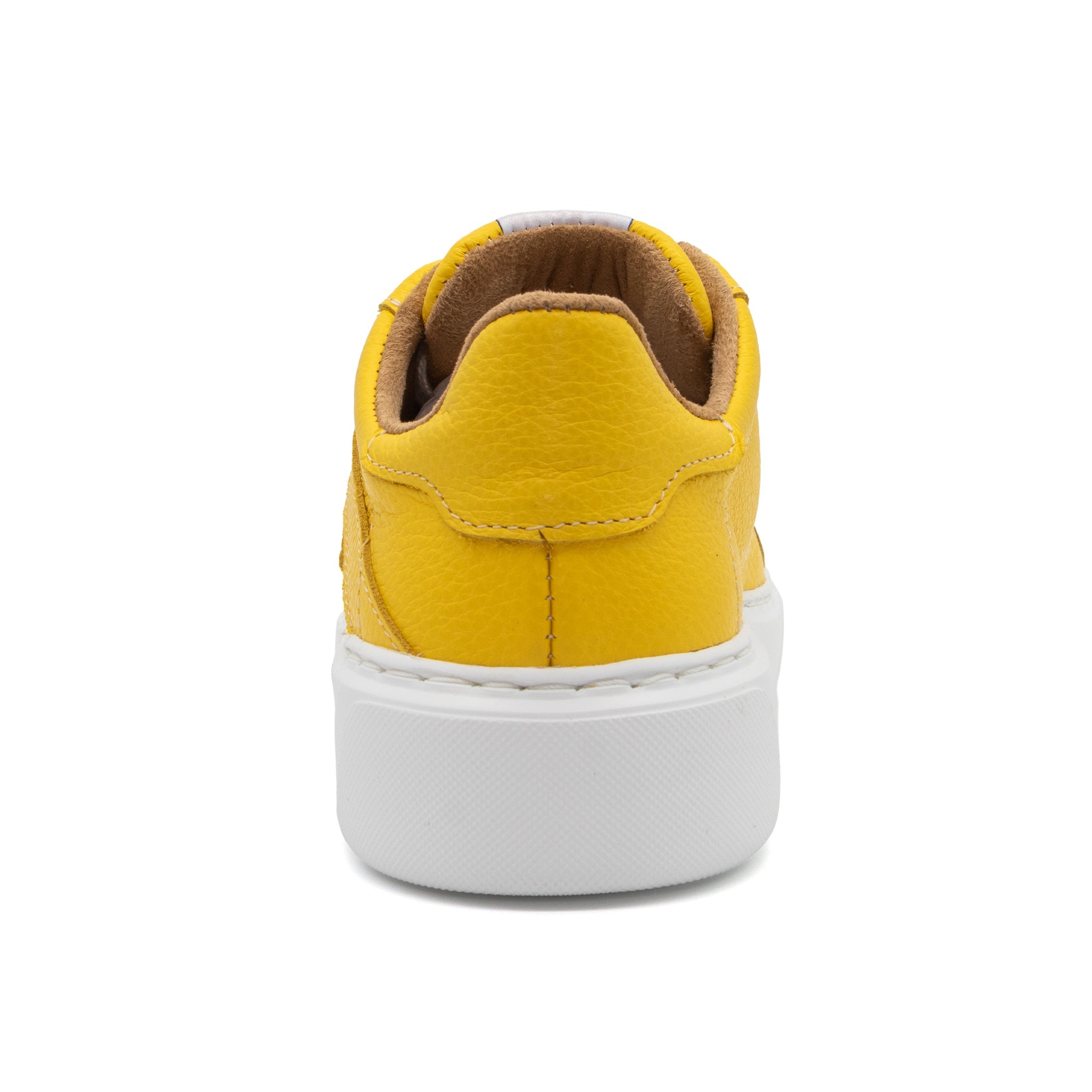 Yellow BLKSWN Footwear 601 Solid lowtop sneaker shown from the back, highlighting its vibrant color and sleek design.