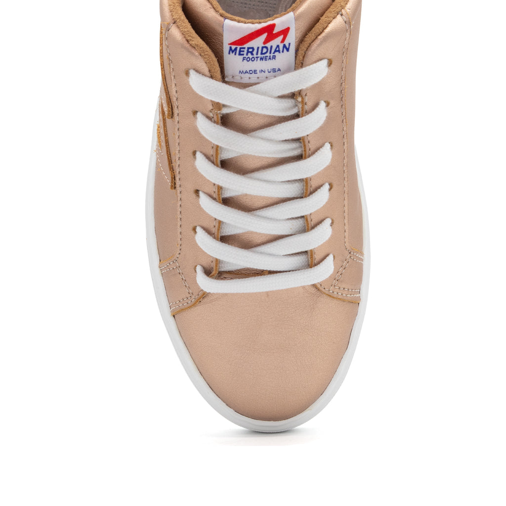 Women's metallic rose gold lowtop sneakers by BLKSWN Footwear with solid metallic finish.