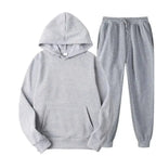 Oversized women's hooded sweatshirt and jogger lounge set made from sparkling 220g polyester fabric by Plush Fashion Hub.