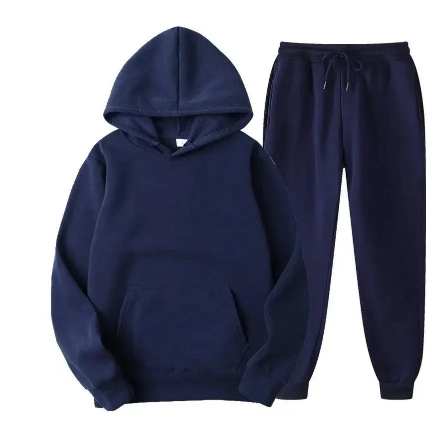Oversized women's hooded sweatshirt and jogger lounge set made of soft polyester fabric from Plush Fashion Hub.