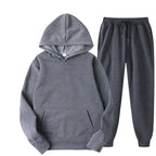 Oversized women's hooded sweatshirt and jogger lounge set in soft polyester fabric by Plush Fashion Hub, sparkling style.