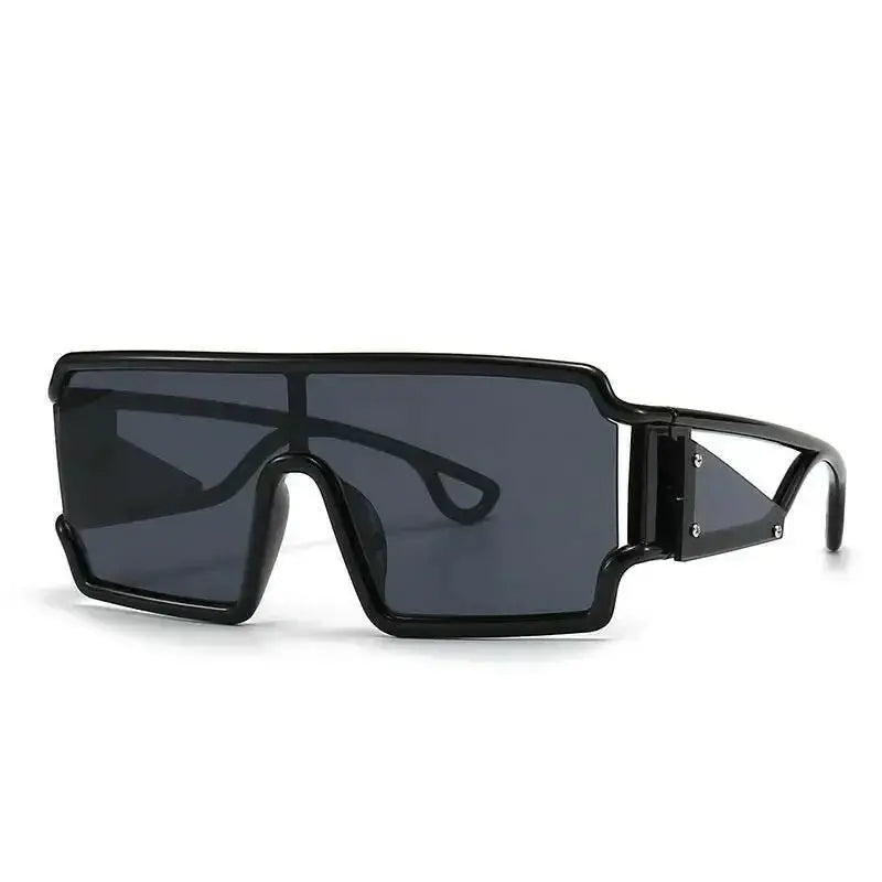 Women's oversized vintage square sunglasses with large rims and retro style, featuring trendy fashion eyewear from Plush Fashion Hub
