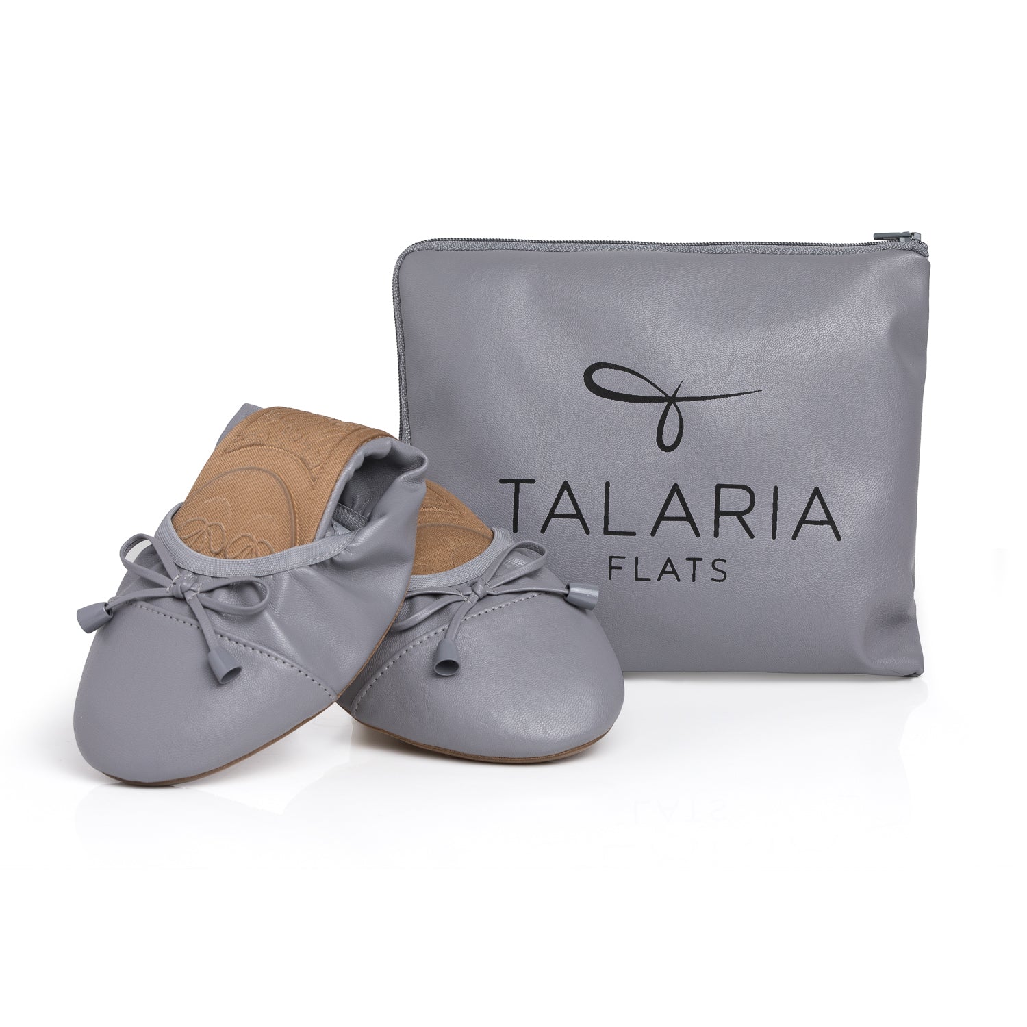 Talaria Flats premium stone grey shoes next to a matching bag, showcasing stylish, comfortable footwear for casual or professional wear.