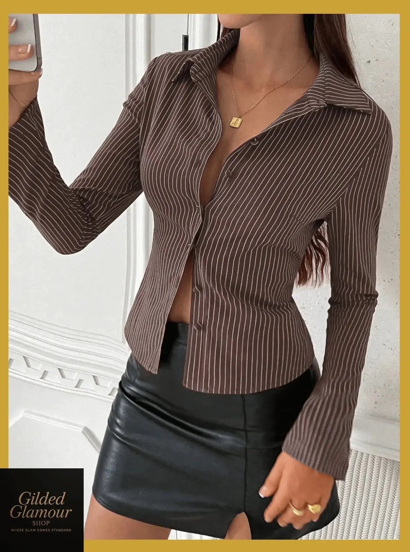 Gilded Glamour Shop classic striped long sleeve button-up shirt with a versatile fit, featuring a collar and button front for workwear.