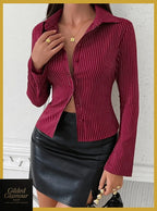 Gilded Glamour Shop striped long sleeve button-up shirt with classic design, versatile stretch fabric, suitable for work or casual wear.