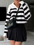 Women's striped dropped shoulder knit sweater top with long sleeves, casual style, from Plush Fashion Hub.