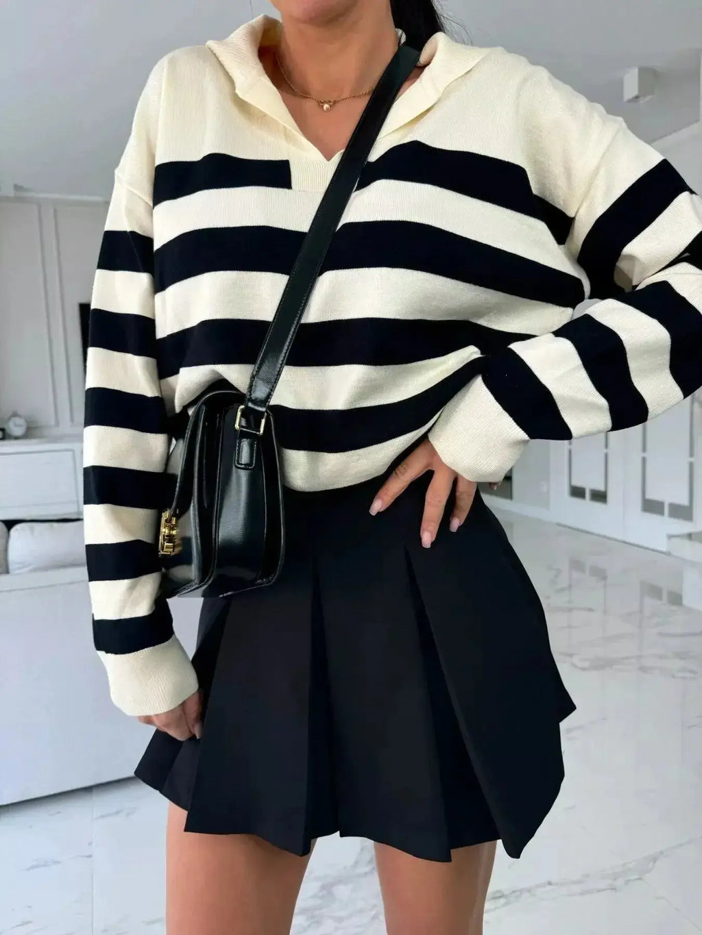 Women's striped dropped shoulder knit sweater top with long sleeves, casual style from Plush Fashion Hub.