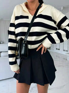Women's striped dropped shoulder knit sweater top with long sleeves, casual style from Plush Fashion Hub.