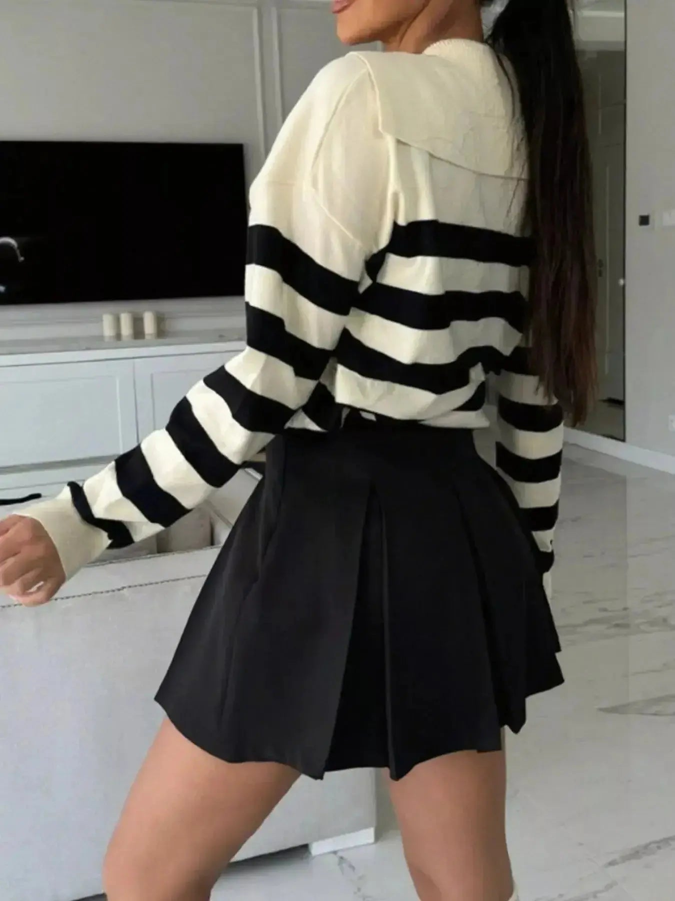 Women's striped dropped shoulder knit sweater top featuring long sleeves, casual style, by Plush Fashion Hub.