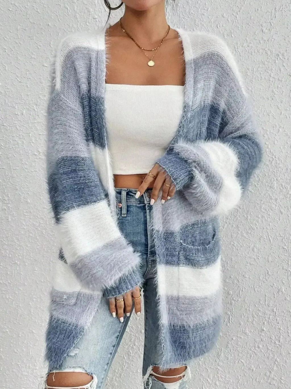 Striped fuzzy knit open front cardigan with pockets by Plush Fashion Hub, cozy layering sweater perfect for casual wear.