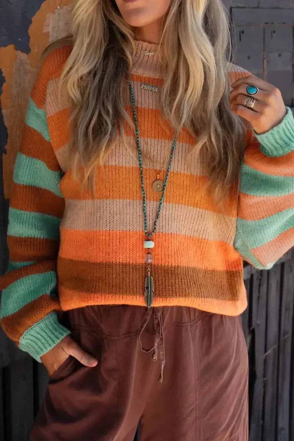 Women's rainbow striped long sleeve knit sweater with soft crewneck, by Plush Fashion Hub, cozy and colorful pullover for casual wear.