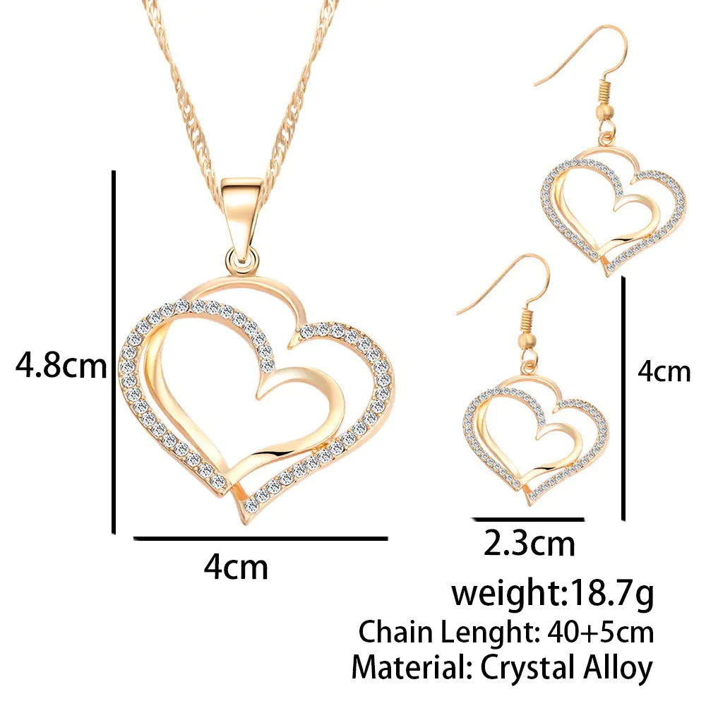 Double heart wedding jewelry set featuring a necklace and earrings with elegant design, perfect for bridal or special occasions.
