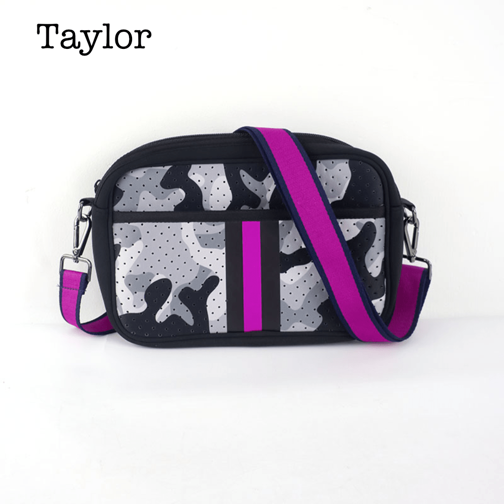 Black neoprene crossbody bag from Threaded Pear with adjustable strap and minimalist design.