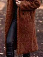 Soft plush teddy bear longline hooded jacket from Plush Fashion Hub, lightweight outerwear with cozy, plush exterior.