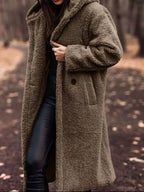 Lightweight plush teddy bear longline hooded jacket from Plush Fashion Hub, soft and cozy outerwear with a plush exterior.