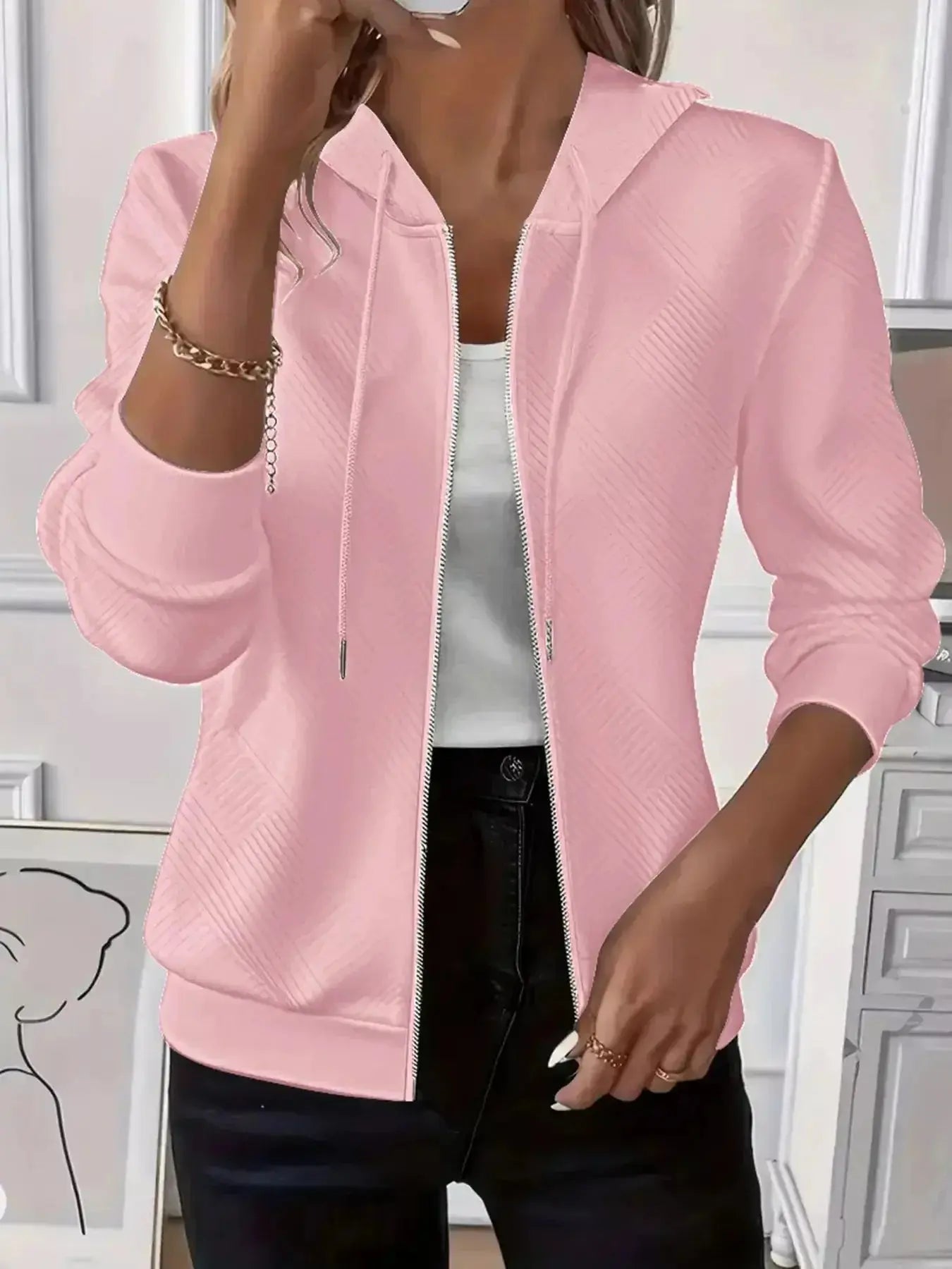 Women's textured zip-up hoodie with adjustable drawstring from Plush Fashion Hub, featuring a soft, cozy fabric and casual style.