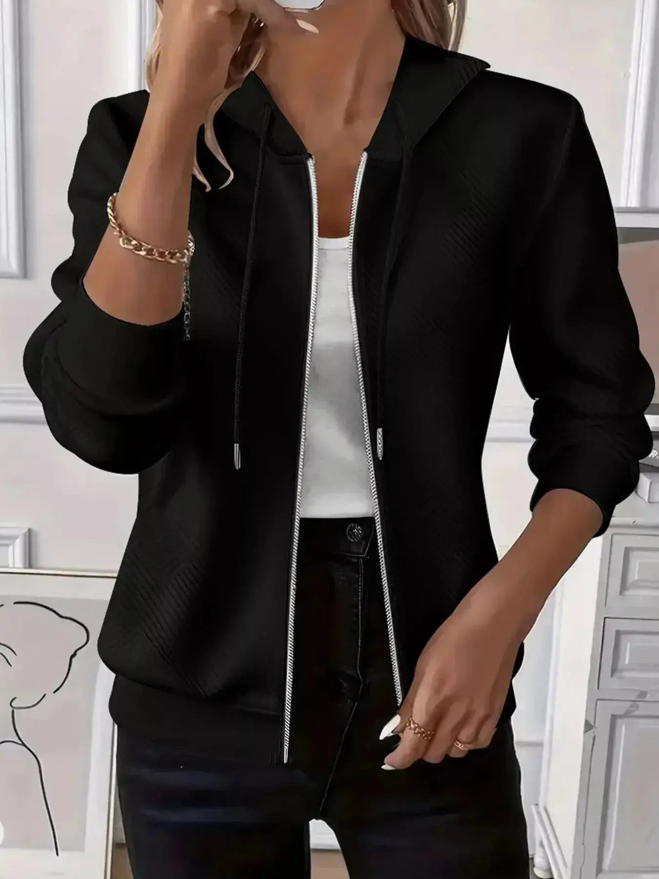 Women's textured zip-up hoodie with adjustable drawstring from Plush Fashion Hub, featuring cozy fabric and stylish design.