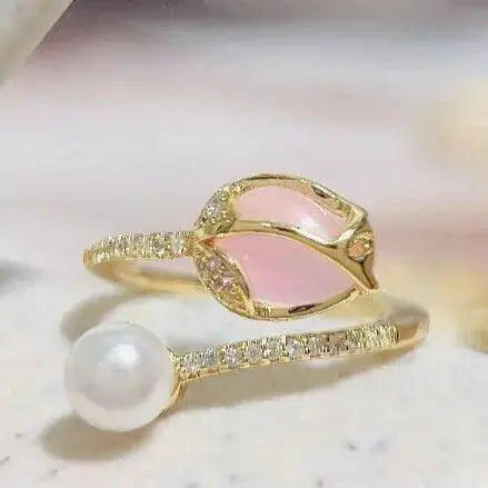 Elegant tulip bud pearl ring by Plush Fashion Hub featuring floral design and adjustable band for stylish statement jewelry.