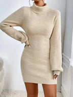 Women’s ribbed knit turtleneck sweater dress with long sleeves, midi length, by Plush Fashion Hub, shown on a model.
