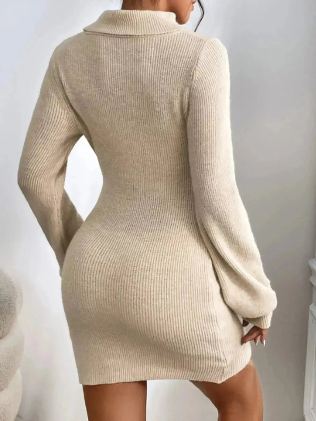 Women's ribbed knit turtleneck sweater dress with long sleeves, midi length, by Plush Fashion Hub, shown on a model.