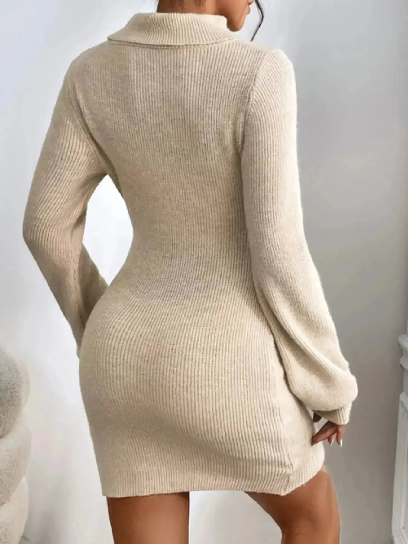 Women's ribbed knit turtleneck sweater dress with long sleeves, midi length, by Plush Fashion Hub, shown on a model.